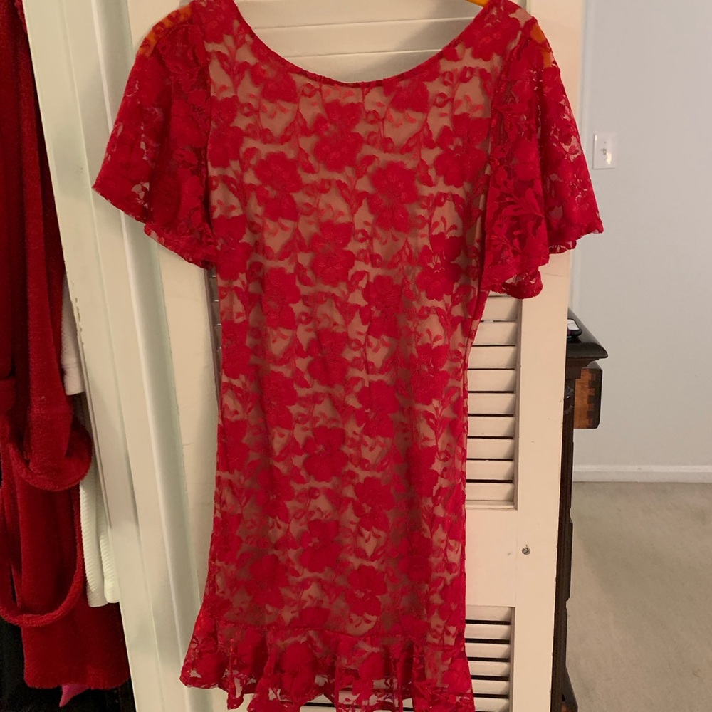 Red tight dress with ruffles on bottom & sleeves